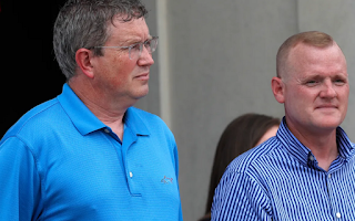 U.S. Rep. Thomas Massie, left, and state Rep. Josh Calloway spoke at the rally. (Courier Journal photo by Scott Utterback)